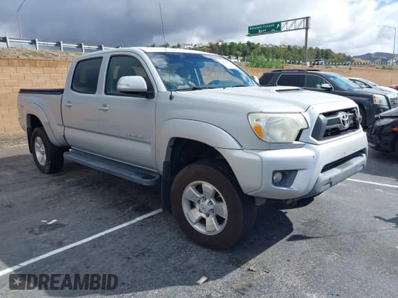 ✅ 2012 Toyota Tacoma PreRunner • VIN: 3TMKU4HN6CM033123 • Lot: 41478582. Listed on IAAI with 89,479 mi. Free auction sales archive from the USA and detailed vehicle history report at DreamBid. Image 1.