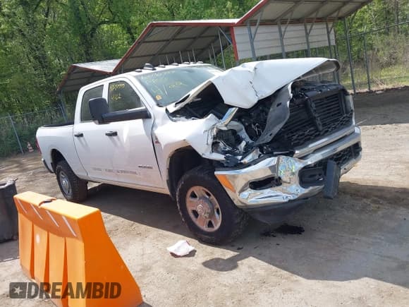 ✅ 2021 Ram 2500 Tradesman • VIN: 3C6UR5CLXMG511265 • Lot: 42090555. Listed on IAAI with 174,841 mi. Free auction sales archive from the USA and detailed vehicle history report at DreamBid. Image 1.