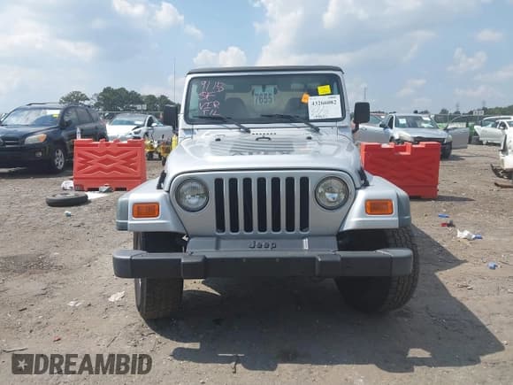 ✅ 2002 Jeep Wrangler X • VIN: 1J4FA39S02P748202 • Lot: 43266082. Wystawiony na IAAI z przebiegiem 199 437 mil. Bezpłatny archiwum sprzedaży aukcyjnych z USA i szczegółowy raport historii pojazdu na DreamBid. Zdjęcie 12.
