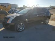 ✅ 2012 Cadillac SRX Performance Collection • VIN: 3GYFNBE33CS646165 • Lot: 90860355. Wystawiony na Copart z przebiegiem 157 539 mil. Bezpłatny archiwum sprzedaży aukcyjnych z USA i szczegółowy raport historii pojazdu na DreamBid. Zdjęcie 1.
