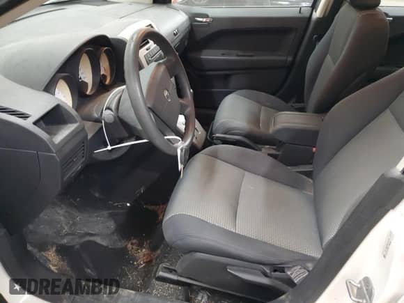 2009 Dodge Caliber SXT с VIN 1B3HB48A29D147770, выставлен на аукционе Copart как лот 77385114 с пробегом 81 938 миль миль и Списание • Salvage title. История ставок и продаж доступна на DreamBid. Изображение 7.