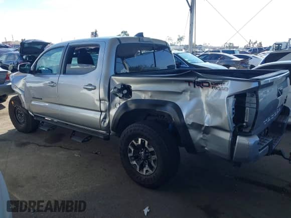 2022 Toyota Tacoma SR5 with VIN 3TMAZ5CN9NM186656, listed as a IAAI auction lot 43253480 with 25,540 mi miles and . Bid and sale history available at DreamBid. Image 3.