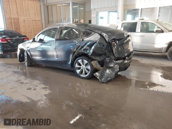 ✅ 2023 Tesla Model Y Long Range • VIN: 7SAYGDEE5PA033341 • Lot: 41379625. Listed on IAAI with Not provided. Free auction sales archive from the USA and detailed vehicle history report at DreamBid. Image 19.