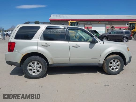 ✅ 2008 Mazda Tribute Touring • VIN: 4F2CZ02Z78KM05402 • Лот: 42076021. Опубликован ранее на IAAI с пробегом 237 405 миль. Бесплатный доступ к архиву аукционных продаж из США и подробный отчёт об истории автомобиля на DreamBid. Изображение 14.