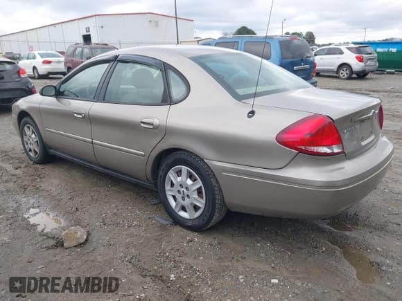 ✅ 2007 Ford Taurus SE • VIN: 1FAFP53U27A164667 • Lot: 43833604. Wystawiony na IAAI z przebiegiem 160 447 mil. Bezpłatny archiwum sprzedaży aukcyjnych z USA i szczegółowy raport historii pojazdu na DreamBid. Zdjęcie 3.