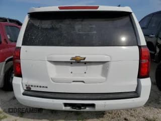 ✅ 2020 Chevrolet Suburban LT • VIN: 1GNSCHKC8LR101428 • Lot: 76412264. Wystawiony na Copart z przebiegiem 74 433 mil. Bezpłatny archiwum sprzedaży aukcyjnych z USA i szczegółowy raport historii pojazdu na DreamBid. Zdjęcie 6.