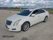 ✅ 2014 Cadillac XTS Premium • VIN: 2G61P5S35E9197414 • Лот: 43481563. Опубликован ранее на IAAI с пробегом 147 604 миль. Бесплатный доступ к архиву аукционных продаж из США и подробный отчёт об истории автомобиля на DreamBid. Изображение 2.