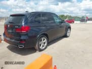 ✅ 2016 BMW X5 xDrive40e • VIN: 5UXKT0C53G0F75048 • Lot: 42973477. Listed on IAAI with 152,684 mi. Free auction sales archive from the USA and detailed vehicle history report at DreamBid. Image 4.