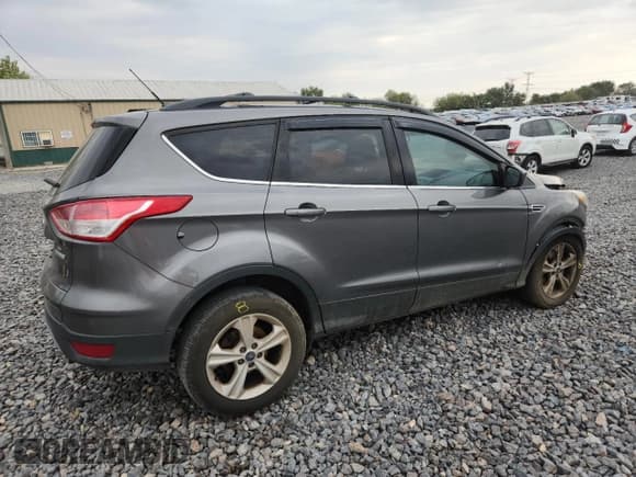 ✅ 2013 Ford Escape SE • VIN: 1FMCU0GX7DUA99477 • Lot: 86485965. Listed on Copart with 94,865 mi. Free auction sales archive from the USA and detailed vehicle history report at DreamBid. Image 3.
