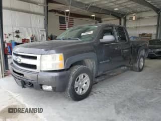 2010 Chevrolet Silverado 1500 LTZ with VIN 1GCSKTE30AZ189656, listed as a Copart auction lot 54202565 with 153,877 mi miles and Salvage title. Bid and sale history available at DreamBid. Image 1.