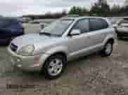 2006 Hyundai Tucson GLS z VIN KM8JN12D76U348077, wystawiony jako Copart lot #85163994 z przebiegiem 152 772 mil mil oraz Czysty tytuł • Clean title. Historia ofert i sprzedaży dostępna na DreamBid. Obrazek 1.