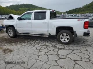 ✅ 2018 Chevrolet Silverado 1500 LT • VIN: 3GCUKREC5JG401737 • Лот: 70502254. Опубликован ранее на Copart с пробегом Не указан. Бесплатный доступ к архиву аукционных продаж из США и подробный отчёт об истории автомобиля на DreamBid. Изображение 2.
