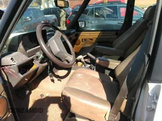 ✅ 1991 Land Rover Range Rover • VIN: SALHV1243MA605889 • Лот: 41728970. Опубликован ранее на IAAI с пробегом Не указан. Бесплатный доступ к архиву аукционных продаж из США и подробный отчёт об истории автомобиля на DreamBid. Изображение 5.