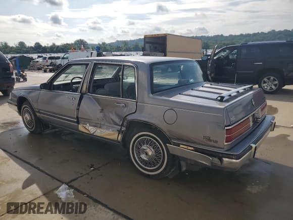✅ 1990 Buick Park Avenue • VIN: 1G4CW54CXL1616831 • Lot: 64422565. Listed on Copart with 61,610 mi. Free auction sales archive from the USA and detailed vehicle history report at DreamBid. Image 2.