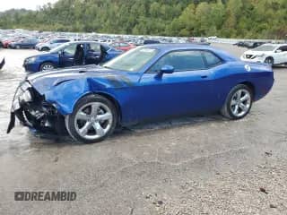 2012 Dodge Challenger R/T Plus с VIN 2C3CDYBT5CH281059, выставлен на аукционе Copart как лот 82060075 с пробегом 131 102 миль миль и Списание • Salvage title. История ставок и продаж доступна на DreamBid. Изображение 1.
