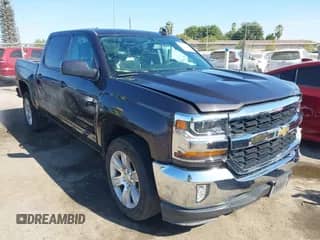 2016 Chevrolet Silverado 1500 LT z VIN 3GCPCREC7GG115486, wystawiony jako IAAI lot #43221263 z przebiegiem 75 276 mil mil oraz . Historia ofert i sprzedaży dostępna na DreamBid. Obrazek 1.