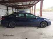 ✅ 2021 Toyota Avalon Hybrid XSE • VIN: 4T1EA1AB4MU002675 • Lot: 43434385. Listed on IAAI with 261,055 mi. Free auction sales archive from the USA and detailed vehicle history report at DreamBid. Image 13.