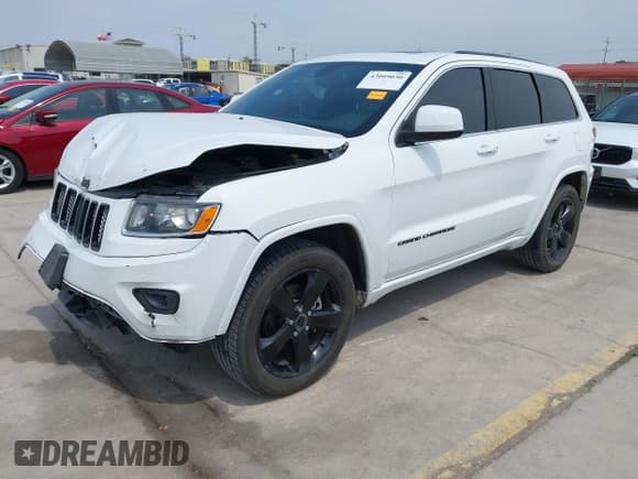 ✅ 2015 Jeep Grand Cherokee Laredo • VIN: 1C4RJEAG7FC104893 • Lot: 43009030. Listed on IAAI with 128,500 mi. Free auction sales archive from the USA and detailed vehicle history report at DreamBid. Image 2.