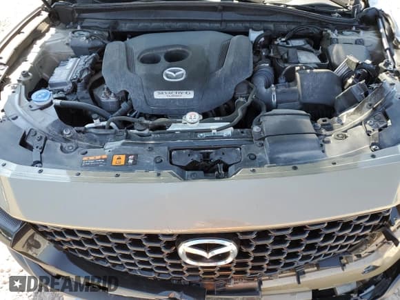 ✅ 2024 Mazda CX-50 Premium • VIN: 7MMVABDY8RN159332 • Lot: 67999815. Wystawiony na Copart z przebiegiem 22 838 mil. Bezpłatny archiwum sprzedaży aukcyjnych z USA i szczegółowy raport historii pojazdu na DreamBid. Zdjęcie 12.