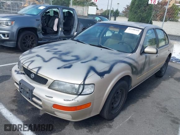 ✅ 1996 Nissan Maxima GXE • VIN: JN1CA21DXTT145544 • Лот: 42598268. Опубликован ранее на IAAI с пробегом 128 386 миль. Бесплатный доступ к архиву аукционных продаж из США и подробный отчёт об истории автомобиля на DreamBid. Изображение 2.