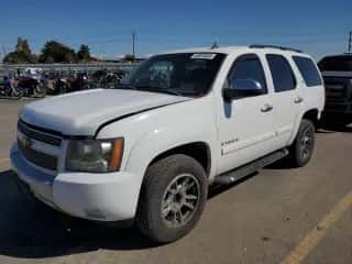 2007 Chevrolet Tahoe LS с VIN 1GNFK13057R426575, выставлен на аукционе Copart как лот 84923835 с пробегом 179 540 миль миль и Списание • Salvage title. История ставок и продаж доступна на DreamBid. Изображение 1.