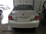 ✅ 2004 Mitsubishi Lancer Ralliart • VIN: JA3AJ66F64U029144 • Лот: 77437234. Опубликован ранее на Copart с пробегом 158 049 миль. Бесплатный доступ к архиву аукционных продаж из США и подробный отчёт об истории автомобиля на DreamBid. Изображение 6.