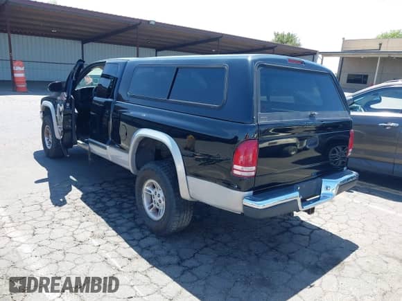 1997 Dodge Dakota with VIN 1B7GG23YXVS187587, listed as a IAAI auction lot 42598352 with 180,375 mi miles and . Bid and sale history available at DreamBid. Image 3.
