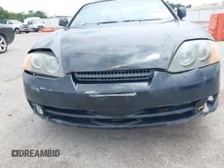 2003 Hyundai Tiburon GT с VIN KMHHN65F63U072432, выставлен на аукционе IAAI как лот 42813911 с пробегом 162 894 миль миль и . История ставок и продаж доступна на DreamBid. Изображение 6.