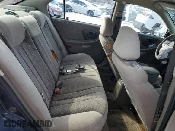 2000 Chevrolet Malibu z VIN 1G1ND52JXY6340769, wystawiony jako Copart lot #45321385 z przebiegiem Nie podano mil oraz Szkoda całkowita • Salvage title. Historia ofert i sprzedaży dostępna na DreamBid. Obrazek 11.