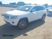 ✅ 2014 Jeep Grand Cherokee Limited • VIN: 1C4RJEBMXEC555965 • Lot: 43338067. Listed on IAAI with 164,506 mi. Free auction sales archive from the USA and detailed vehicle history report at DreamBid. Image 2.