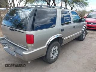 ✅ 2002 Chevrolet Blazer LS • VIN: 1GNDT13W32K218169 • Lot: 42397295. Wystawiony na IAAI z przebiegiem 99 970 mil. Bezpłatny archiwum sprzedaży aukcyjnych z USA i szczegółowy raport historii pojazdu na DreamBid. Zdjęcie 4.