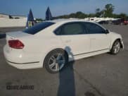 ✅ 2014 Volkswagen Passat SEL Premium • VIN: 1VWCN7A31EC035777 • Лот: 80261605. Опубликован ранее на Copart с пробегом 134 143 миль. Бесплатный доступ к архиву аукционных продаж из США и подробный отчёт об истории автомобиля на DreamBid. Изображение 3.