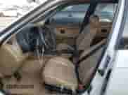 1996 BMW 3 Series z VIN 4USCD7322TLC50315, wystawiony jako Copart lot #87952885 z przebiegiem 318 396 mil mil oraz Szkoda całkowita • Salvage title. Historia ofert i sprzedaży dostępna na DreamBid. Obrazek 7.