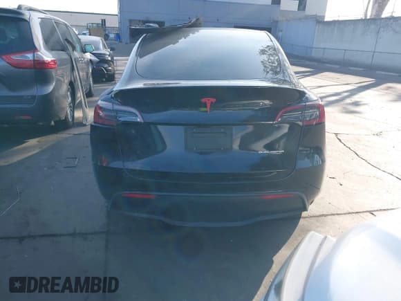 ✅ 2022 Tesla Model Y Long Range • VIN: 7SAYGDEE0NF351433 • Lot: 43582029. Listed on IAAI with 69,170 mi. Free auction sales archive from the USA and detailed vehicle history report at DreamBid. Image 15.