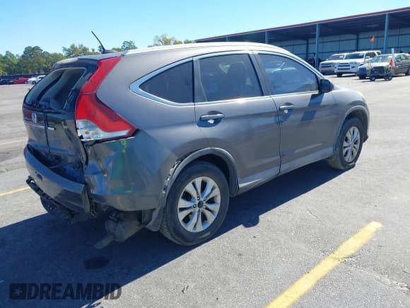 ✅ 2014 Honda CR-V EX-L • VIN: 2HKRM3H71EH541812 • Lot: 43513265. Listed on IAAI with 140,042 mi. Free auction sales archive from the USA and detailed vehicle history report at DreamBid. Image 4.