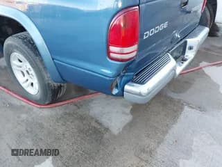 ✅ 2003 Dodge Dakota SLT • VIN: 1D7HL42N93S196397 • Lot: 42105857. Wystawiony na IAAI z przebiegiem 159 690 mil. Bezpłatny archiwum sprzedaży aukcyjnych z USA i szczegółowy raport historii pojazdu na DreamBid. Zdjęcie 6.