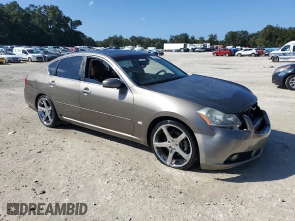 ✅ 2006 Infiniti M • VIN: JNKBY01E06M203322 • Lot: 78189624. Listed on Copart with 140,587 mi. Free auction sales archive from the USA and detailed vehicle history report at DreamBid. Image 4.