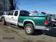 ✅ 2004 Dodge Dakota Sport • VIN: 1D7HG32N44S540671 • Лот: 80000954. Размещён на Copart с пробегом 140 475 миль миль. Получите бесплатный доступ к архиву аукционных продаж из США и посмотрите подробный отчёт об истории автомобиля на DreamBid. Изображение 2.