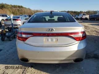 2012 Hyundai Azera z VIN KMHFH4JG3CA193325, wystawiony jako Copart lot #82984174 z przebiegiem 129 408 mil mil oraz Szkoda całkowita • Salvage title. Historia ofert i sprzedaży dostępna na DreamBid. Obrazek 6.