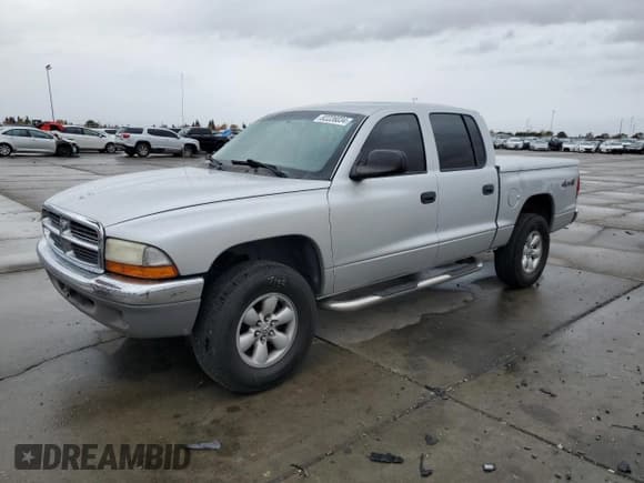 ✅ 2004 Dodge Dakota SLT • VIN: 1D7HG48N34S774345 • Lot: 82226034. Wystawiony na Copart z przebiegiem 177 733 mil. Bezpłatny archiwum sprzedaży aukcyjnych z USA i szczegółowy raport historii pojazdu na DreamBid. Zdjęcie 1.