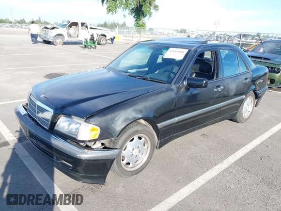 ✅ 2000 Mercedes-Benz C 230 Kompressor • VIN: WDBHA24G4YA799207 • Lot: 42010800. Wystawiony na IAAI z przebiegiem 126 478 mil. Bezpłatny archiwum sprzedaży aukcyjnych z USA i szczegółowy raport historii pojazdu na DreamBid. Zdjęcie 2.