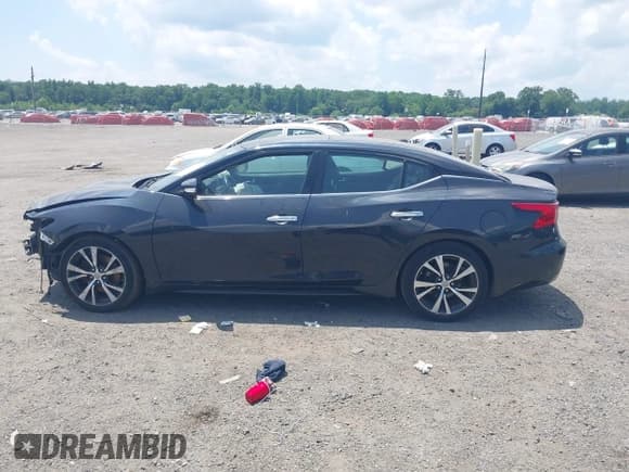 ✅ 2017 Nissan Maxima Platinum • VIN: 1N4AA6AP2HC427633 • Lot: 42593090. Listed on IAAI with 106,093 mi. Free auction sales archive from the USA and detailed vehicle history report at DreamBid. Image 15.