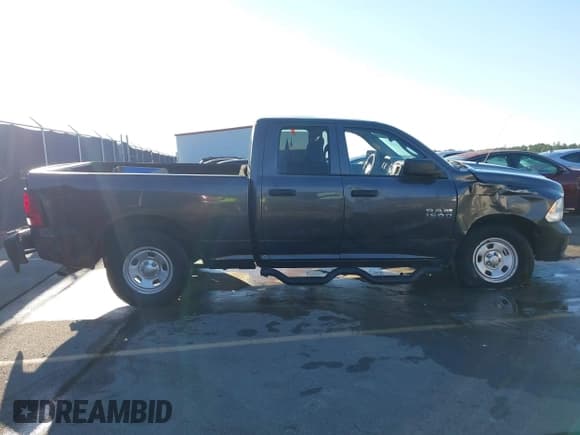 ✅ 2015 Ram 1500 Tradesman • VIN: 1C6RR6FGXFS535247 • Lot: 43619651. Listed on IAAI with 184,134 mi. Free auction sales archive from the USA and detailed vehicle history report at DreamBid. Image 13.
