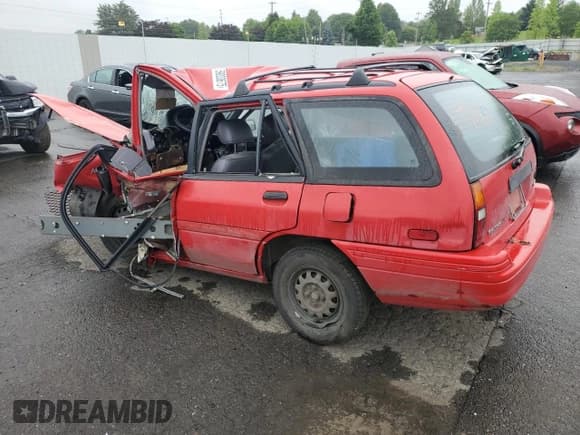 ✅ 1993 Ford Escort LX • VIN: 1FAPP15J9PW255079 • Lot: 59003675. Listed on Copart with 122,208 mi. Free auction sales archive from the USA and detailed vehicle history report at DreamBid. Image 2.