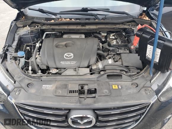 ✅ 2016 Mazda CX-5 Grand Touring • VIN: JM3KE4DY7G0859184 • Lot: 92858065. Wystawiony na Copart z przebiegiem 45 518 mil. Bezpłatny archiwum sprzedaży aukcyjnych z USA i szczegółowy raport historii pojazdu na DreamBid. Zdjęcie 11.