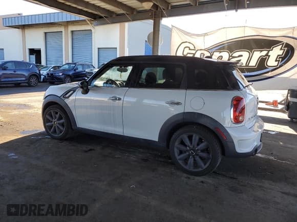 ✅ 2013 MINI Countryman S • VIN: WMWZC3C56DWP24458 • Lot: 93453685. Listed on Copart with 124,187 mi. Free auction sales archive from the USA and detailed vehicle history report at DreamBid. Image 2.