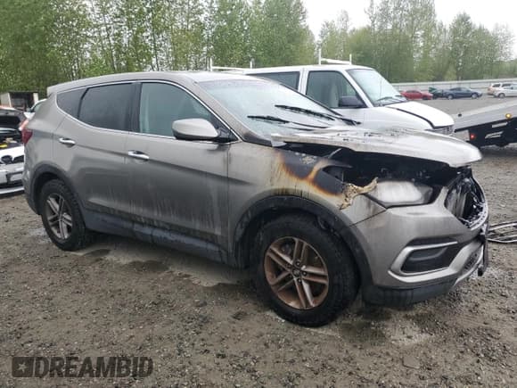 ✅ 2017 Hyundai Santa Fe 2.4L • VIN: 5NMZTDLB6HH002351 • Лот: 52313844. Опубликован ранее на Copart с пробегом Не указан. Бесплатный доступ к архиву аукционных продаж из США и подробный отчёт об истории автомобиля на DreamBid. Изображение 4.