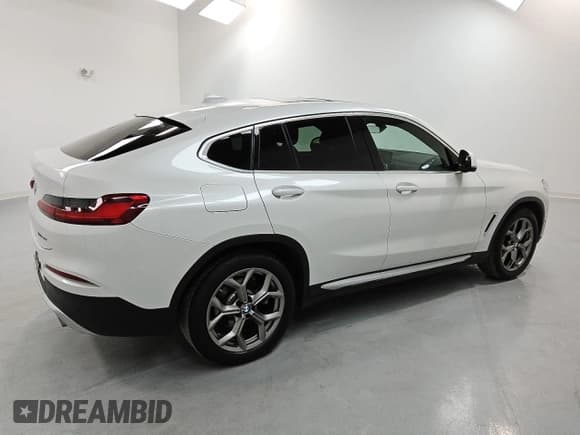 ✅ 2021 BMW X4 xDrive30i • VIN: 5UX2V1C04M9E94765 • Lot: 49813915. Listed on Copart with 34,483 mi. Free auction sales archive from the USA and detailed vehicle history report at DreamBid. Image 3.