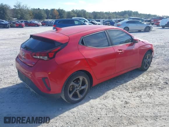 2019 Hyundai Veloster Premium with VIN KMHTG6AF4KU016305, listed as a IAAI auction lot 41016439 with 80,676 mi miles and . Bid and sale history available at DreamBid. Image 4.