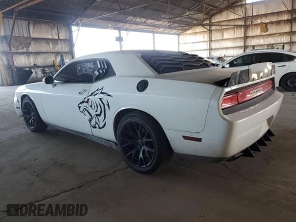✅ 2011 Dodge Challenger • VIN: 2B3CJ4DG7BH596975 • Lot: 42222095. Wystawiony na Copart z przebiegiem 190 592 mil. Bezpłatny archiwum sprzedaży aukcyjnych z USA i szczegółowy raport historii pojazdu na DreamBid. Zdjęcie 2.